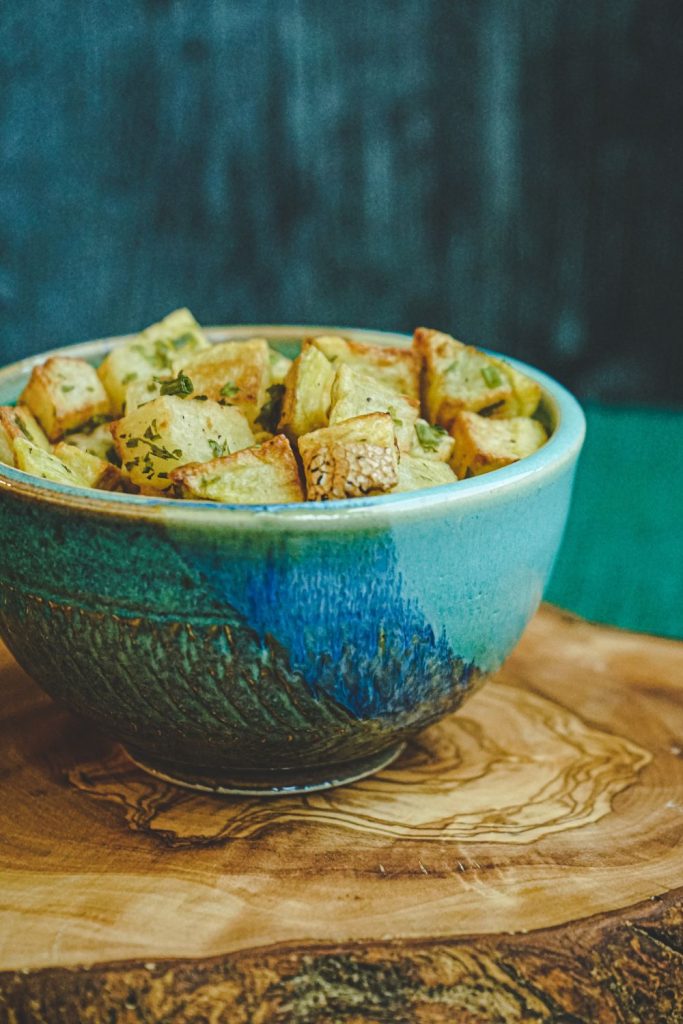 This is home fries in a bowl.
