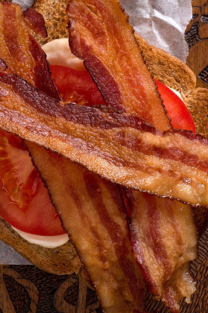 This is a closeup of bacon on a BLT sandwich.