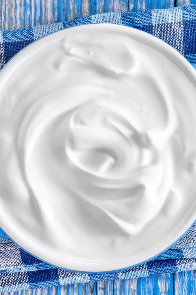 This is a close up of sour cream in a bowl.
