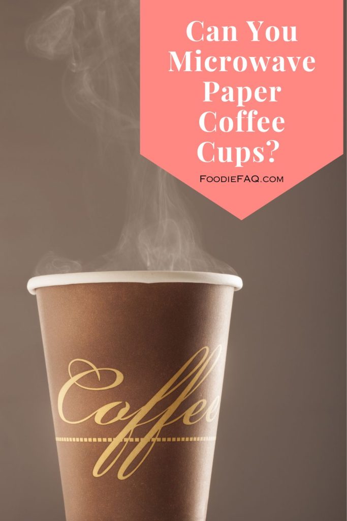 This is a paper cup of hot coffee with smoke.